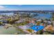 Aerial view showing home's location on a waterfront canal, near other houses at 409 161St Ave, Redington Beach, FL 33708
