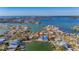 Wide aerial showcasing the property and its waterfront access at 409 161St Ave, Redington Beach, FL 33708