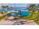 Aerial view of a light blue house with a detached garage at 409 161St Ave, Redington Beach, FL 33708