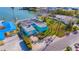 Aerial view of teal house and surrounding waterfront community at 409 161St Ave, Redington Beach, FL 33708