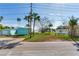 Vacant lot with large tree, offering waterfront views at 409 161St Ave, Redington Beach, FL 33708