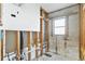 Bathroom stripped for renovation, showing plumbing and framing at 4610 Bay Crest Dr, Tampa, FL 33615