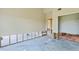 Unfinished bedroom with exposed wall and flooring at 4610 Bay Crest Dr, Tampa, FL 33615