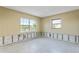 Spacious bedroom with large windows and a view at 4610 Bay Crest Dr, Tampa, FL 33615