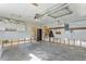 Unfinished garage with ample storage space and access to the house at 4610 Bay Crest Dr, Tampa, FL 33615