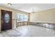 A living room undergoing renovation, showing exposed walls and floors at 4610 Bay Crest Dr, Tampa, FL 33615