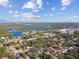 High-level aerial view showing home and surrounding landscape at 605 E Spruce St, Tarpon Springs, FL 34689