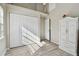 Spacious bedroom with ample closet space and light flooring at 605 E Spruce St, Tarpon Springs, FL 34689