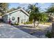 Charming bungalow with landscaped yard and spacious driveway at 605 E Spruce St, Tarpon Springs, FL 34689