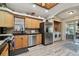 Modern kitchen with stainless steel appliances and ample cabinet space at 605 E Spruce St, Tarpon Springs, FL 34689