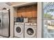 Convenient laundry room with washer and dryer included at 605 E Spruce St, Tarpon Springs, FL 34689