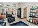 Open floor plan with a view of the kitchen and access to other rooms at 605 E Spruce St, Tarpon Springs, FL 34689