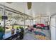 Spacious screened porch, perfect for relaxing and enjoying the outdoors at 605 E Spruce St, Tarpon Springs, FL 34689