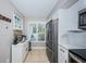Well-equipped kitchen with stainless steel appliances at 6382 Palma Del Mar S Blvd # 123, St Petersburg, FL 33715