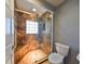 Walk-in shower with tiled walls and built-in seat at 703 Elkhorn Rd, Sun City Center, FL 33573