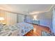 Bedroom with hardwood floors and ceiling fan at 703 Elkhorn Rd, Sun City Center, FL 33573