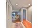 Bright foyer with hardwood floors and access to living areas at 703 Elkhorn Rd, Sun City Center, FL 33573