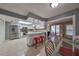 Galley kitchen with stainless steel appliances and granite countertops at 703 Elkhorn Rd, Sun City Center, FL 33573