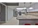 Modern kitchen with stainless steel appliances and granite countertops at 703 Elkhorn Rd, Sun City Center, FL 33573