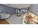 Spacious living room with hardwood floors and neutral decor at 703 Elkhorn Rd, Sun City Center, FL 33573