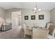 Dining room with table and chairs, view to living room at 715 Masterpiece Dr # 715, Sun City Center, FL 33573