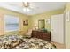 Guest bedroom with twin beds and ceiling fan at 719 Indian Wells Ave, Sun City Center, FL 33573