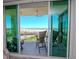 Spacious balcony with ocean views and comfortable seating at 800 Collany Rd # 401, Tierra Verde, FL 33715