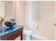 Elegant powder room with unique sink and modern fixtures at 800 Collany Rd # 401, Tierra Verde, FL 33715