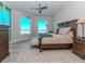 Main bedroom with king-size bed and stunning ocean views at 800 Collany Rd # 401, Tierra Verde, FL 33715