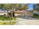 Two-car garage and well maintained lawn at 14222 Beauly Cir, Hudson, FL 34667