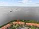 Wide aerial view of the condo and waterfront at 1814 Mariner Dr # 159, Tarpon Springs, FL 34689
