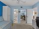 Guest bedroom with access to bathroom and office at 1814 Mariner Dr # 159, Tarpon Springs, FL 34689