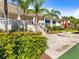Clubhouse with patio area, landscaping, and picnic tables at 1814 Mariner Dr # 159, Tarpon Springs, FL 34689