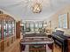 Condo dining area with water views and hardwood floors at 1814 Mariner Dr # 159, Tarpon Springs, FL 34689