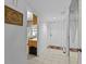 Condo entryway with tile floors and kitchen peek at 1814 Mariner Dr # 159, Tarpon Springs, FL 34689