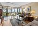 Bright living room with water views, comfy seating, and a glass-top coffee table at 1814 Mariner Dr # 159, Tarpon Springs, FL 34689