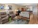 Spacious living room featuring hardwood floors and ample natural light at 1814 Mariner Dr # 159, Tarpon Springs, FL 34689