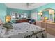 Main bedroom with king-size bed and water views at 1814 Mariner Dr # 159, Tarpon Springs, FL 34689
