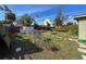 Backyard with shed and small patio at 316 Country Club Dr, Oldsmar, FL 34677