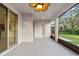 Spacious screened porch with access to backyard at 4104 Warwick Hills Dr, Wesley Chapel, FL 33543