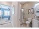 Bathroom with a large walk-in shower and granite vanity at 5006 Ruby Flats Dr, Wimauma, FL 33598