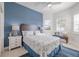 Cozy bedroom with a comfortable bed and plenty of natural light at 5006 Ruby Flats Dr, Wimauma, FL 33598