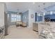 Modern kitchen featuring an island and stainless steel appliances at 5006 Ruby Flats Dr, Wimauma, FL 33598