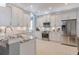 Modern kitchen with stainless steel appliances and granite countertops at 5006 Ruby Flats Dr, Wimauma, FL 33598