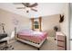 Bright bedroom with a queen-size bed and window at 6006 Soaring Ave, Temple Terrace, FL 33617