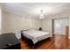 Bright bedroom with hardwood floors and a spacious layout at 6006 Soaring Ave, Temple Terrace, FL 33617