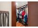Walk-in closet with ample shelving and hanging space at 6006 Soaring Ave, Temple Terrace, FL 33617