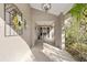 Front entry with covered walkway and tile flooring at 6006 Soaring Ave, Temple Terrace, FL 33617