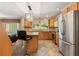 Kitchen boasts granite countertops and stainless steel appliances at 6006 Soaring Ave, Temple Terrace, FL 33617