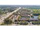 Aerial view of townhouses near a lake and highway at 6232 Bayside Key Dr, Tampa, FL 33615